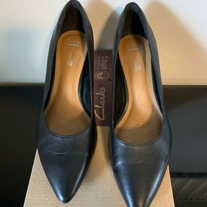 Clark’s Crewso Wick Black Pumps.